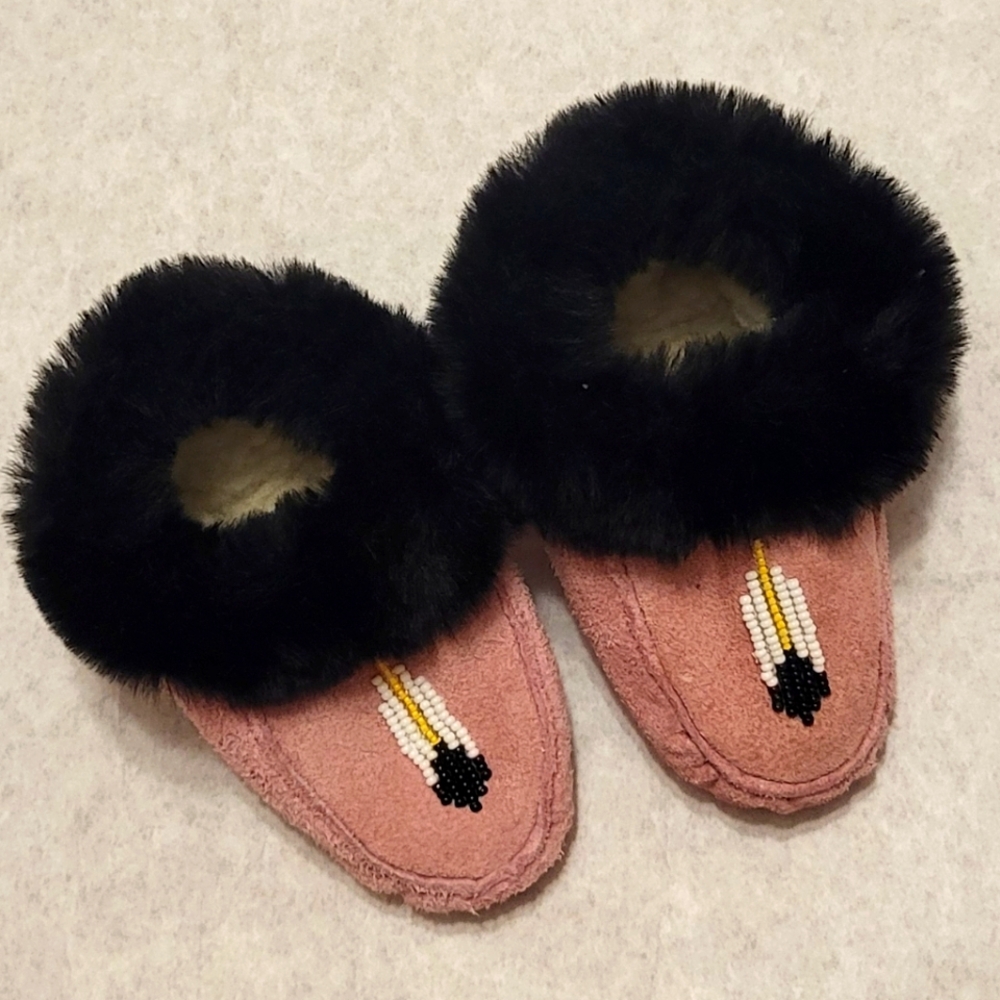 Handmade pink suede baby mocassins